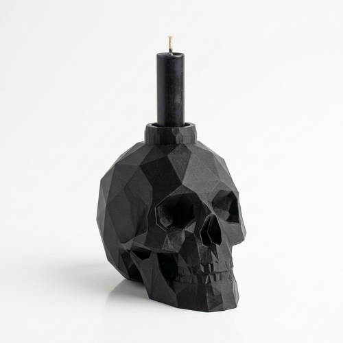 Bougeoir tête de mort low-poly noir avec bougie